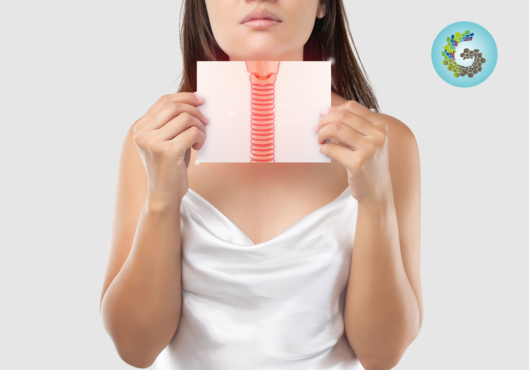 A woman holding an image of esophageal, depicting Esophageal (Food Pipe) cancer Surgery in Indore